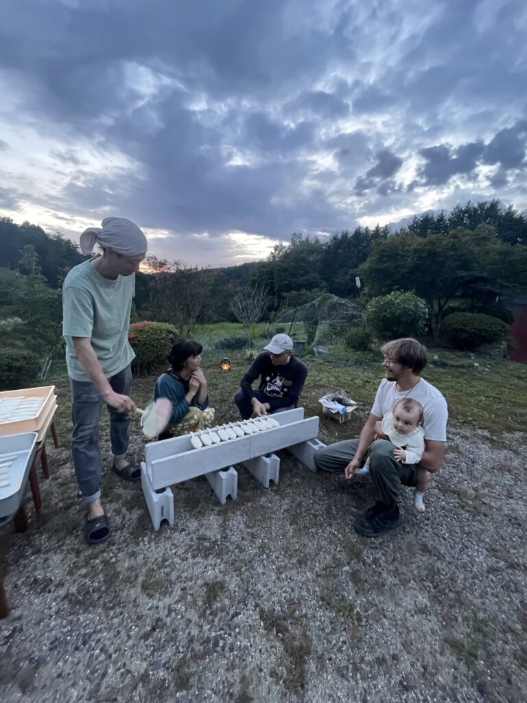 Chilling in the garden of the guesthouse during the magic hour at dusk