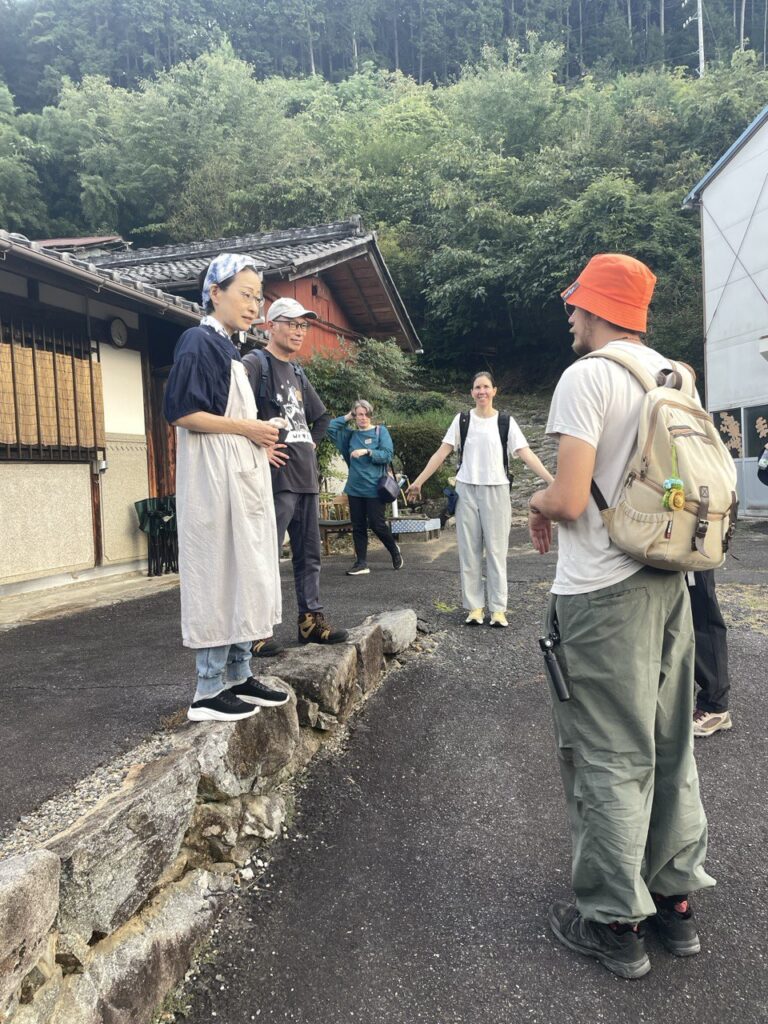 Farewell scene with locals in rural Japan
